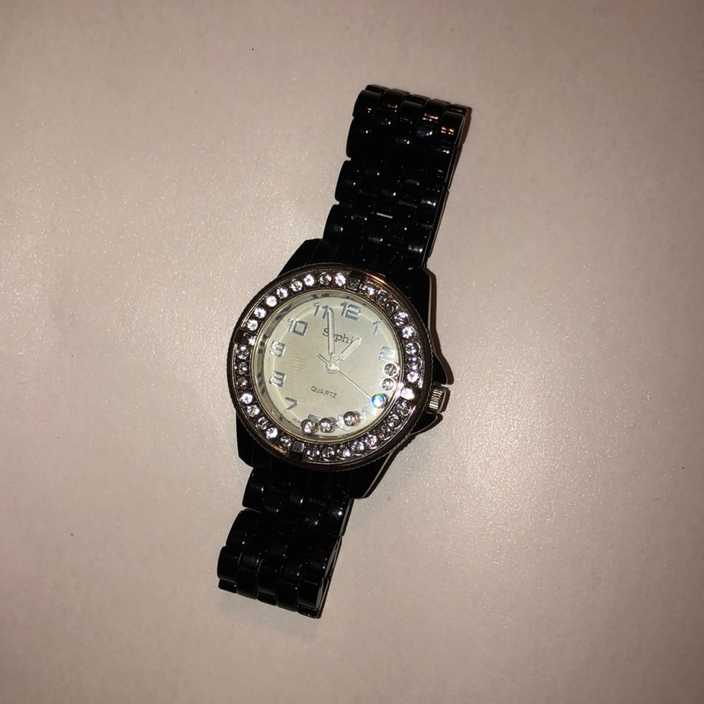 woman’s black quartz watch